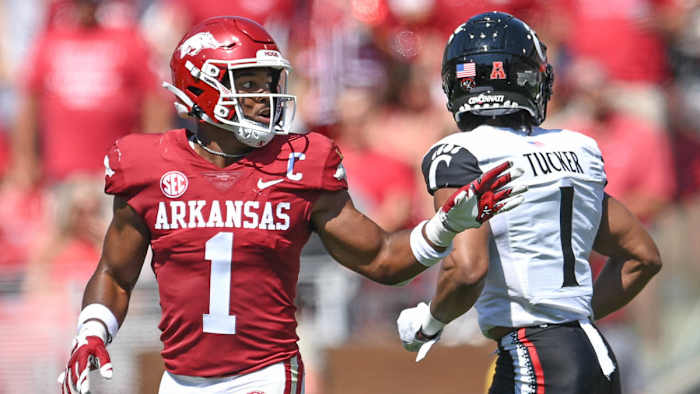 Arkansas safety Jalen Catalon directs the defense against Cincinnati.